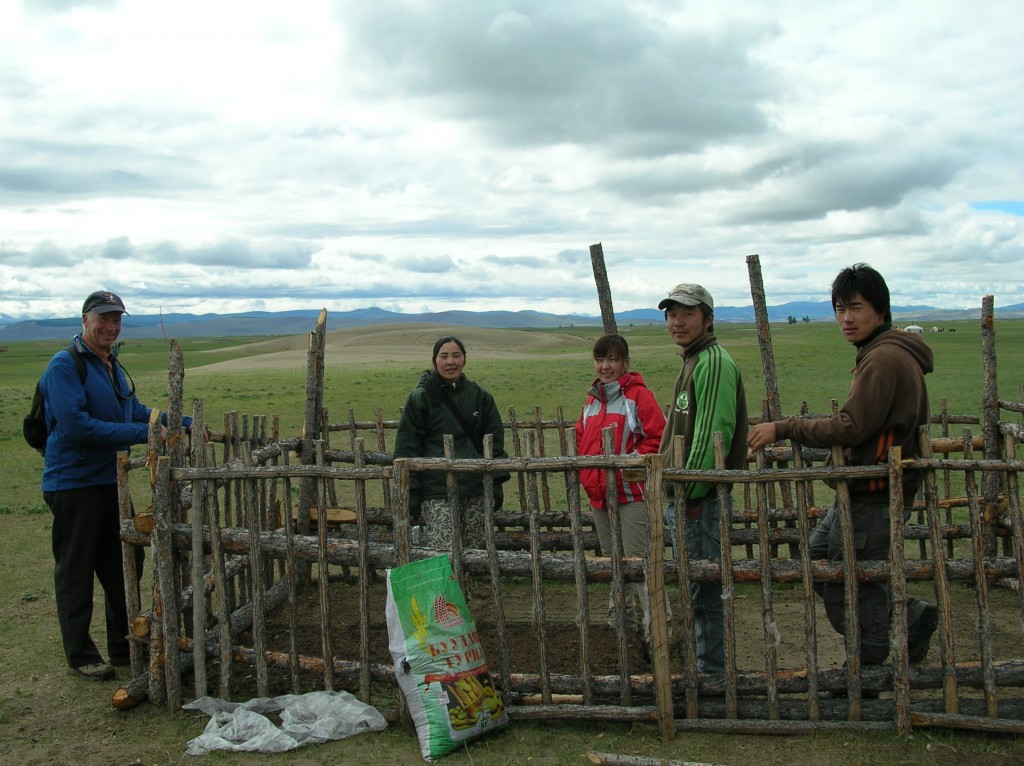 University students and staff with moss biologist Enkhjargal and Cliff in a study plot